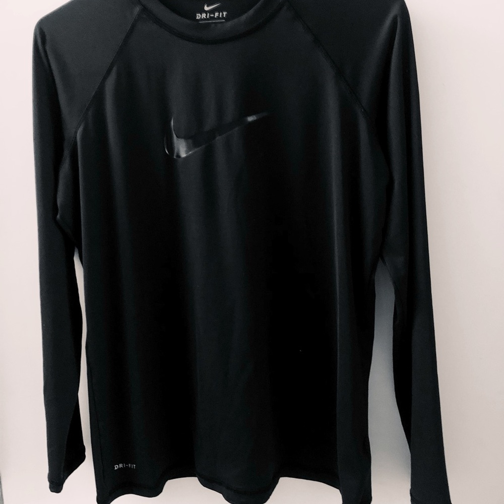 Nike swim shirt.  Gently used excellent condition.